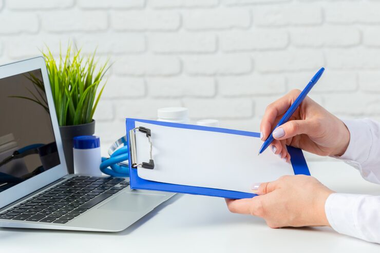 doctor-writes-prescription-pil_93675-83153